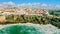 Aerial view of a beautiful tourist town located on the rocky shore of the Atlantic Ocean.  Panorama of the city from drone with a