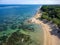 Aerial view of a beautiful tropical beach protected by a fringing tropical coral reef (Sanur, Bali