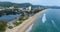 Aerial view of beautiful tropical blue sea and long beach from birds eye view, Karon Beach, Phuket island