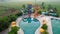 Aerial view of Beautiful umbrella around outdoor swimming pool in hotel resort for vacation travel at Bekasi