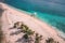 Aerial view of a beautiful white-sand beach and crystal-clear waters of Hagonoy Island Beach