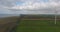 Aerial View. Beautiful windmill turbines , wind energy turbines . Aerial drone shot. 4K
