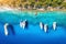 Aerial view of beautiful yachts, boats on the sea bay at sunset