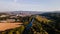 Aerial view of Becva river and ponds lying next to water during sunny afternoon