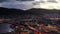 Aerial view of Bergen, Norway at night. Colorful cloudy sky