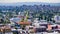 Aerial view of Berkeley and north Oakland on a sunny day; downtown Oakland in the background; buildings in UC Berkeley in the