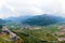 Aerial view of Beseno Castle and northern vineyards, the largest fortified structure in Besenello, Trento, Italy. wide panorama