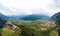 Aerial view of Beseno Castle and northern vineyards, the largest fortified structure in Besenello, Trento, Italy. wide panorama