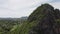 Aerial view of big Buddha statue on mountain cliff with the landscape view. statue under construction.