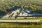 Aerial view of big rest area near busy american freeway with fast moving cars and trucks. Recreational place during