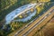 Aerial view of big rest area near busy american freeway with fast moving cars and trucks. Recreational place during