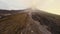 Aerial view black frozen lava magma in smoke canyon foot large active erupting