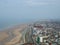 Aerial view of blackpool looking south showing the beach at low tide with the roads and buildings of the town and coast