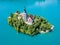 Aerial view of Bled Island or Blejski otok, Assumption of Mary church with a tower and spire, on mountain Bled lake, Slovenia.