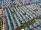 Aerial view of blue houses. Residential neighborhood. Urban housing development from above. Top view. Real estate in Shanghai City