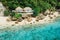 Aerial view of blue ocean and coastline with cozy hotels resort on Impossibles beach in Bali island