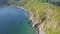 Aerial View Blue Ocean and Green Hilly Rocky Coast