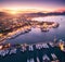 Aerial view of boats and beautiful city at sunset in Marmaris, T