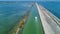 Aerial view of boats in canal in lagoon of Mediterranean sea Etang de Thau water from above, travel by barge in France