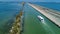 Aerial view of boats in canal in lagoon of Mediterranean sea Etang de Thau water from above, travel by barge in France