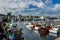 Aerial view of boats parked in port of Puertollano in background of buildings