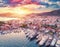 Aerial view of boats and yachts and beautiful city at sunset
