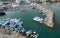 Aerial view of boats and yachts moored in a marina. Drone view from above. Ayia Napa Cyprus