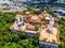 Aerial view of bodhisattva architecture and double sky dragon in Chau Thoi pagoda, Binh Duong province, Vietnam in the afternoon