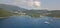 Aerial view of the Boka Kotorska, entrance into the fjord of Montenegro leading to the city of Kotor. Yacht and boats