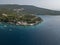 Aerial view of the Boka Kotorska, entrance into the fjord of Montenegro leading to the city of Kotor. Yacht and boats