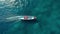 Aerial View Of A Bold And Colorful Sport Boat On The Blue Ocean