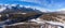 Aerial view of Bow River valley. Snowcapped Canadian Rockies mountain range panorama.