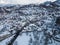 Aerial view of Bran city covered with snow in winter, Romania