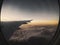 Aerial view of the Brazilian city of Rio de Janeiro, with window and airplane wing.