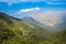 Aerial View In Brazilian Jungle Near Paranapicaba. Rainforest Mountains, Countryside Road, Blue Sky With Beautiful Clouds