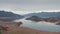 Aerial of view breathtaking landscape with an island with rocky shores exposed due to the small water level in the lake