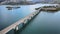 Aerial view of bridge across blue lake in summer landscape in Riano, Castilla y Leon, Spain.