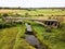 Aerial view of bridge to nowhere. An old bridge in Grenci, Latvia never getting ready