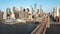 Aerial view of the Brooklyn bridge to Manhattan in New York, America through the East river in sunny day.