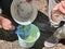 Aerial view bucket fish net and glass eels