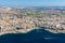 Aerial view of Bugibba town, St. Paul's Bay in the Northern Region, Malta. Popular tourist resort destination with promenade.