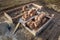 Aerial view of building site. Trenches dug in ground and filled with cement as foundation for future house, brick basement floor