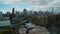 Aerial view of buildings in residential urban borough, traffic jam on elevated multilane trunk road. Famous Manhattan