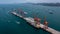 Aerial view bulk carrier dock, Global business import export logistic and transportation company, Commercial dock container cargo