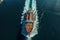 Aerial view of a bulk carrier ship sailing in the sea. Transportation concept with a copy space.