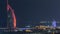 Aerial view of Burj Al Arab hotel from Internet city night timelapse.