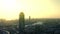 Aerial view of the business center Vysotsky and Ekaterinburg city during sunset. Stock footage. Beautiful panoramic