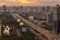 Aerial view of busy cars with traffic jam in the rush hour on highway road street on bridge with advertising sign billboards in