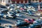 Aerial view of busy and full parking lot with cars arriving and leaving, people waiting at Fort Mason Center for Arts and Culture