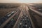 aerial view of busy highway, with cars and trucks moving in both directions